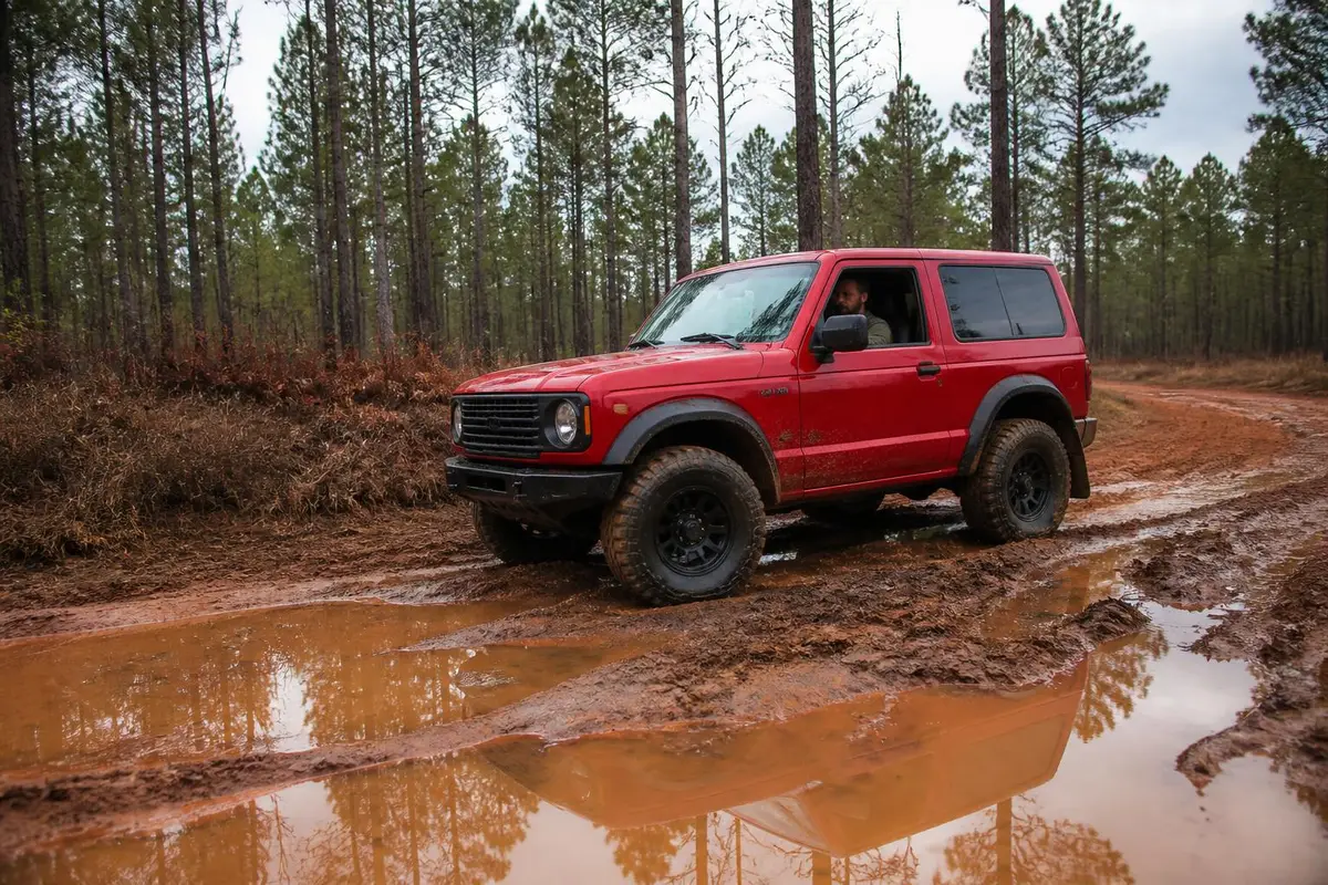 Illustrative: rig on a red clay forest trail