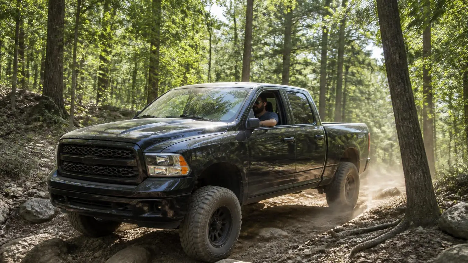 Factory-lifted full-size pickup on a forest trail
